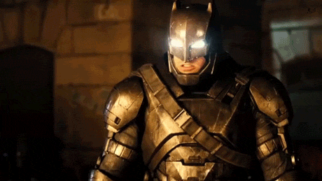 Funny combined GIF of superheros getting glowing eyes and video of cat with glowing eyes