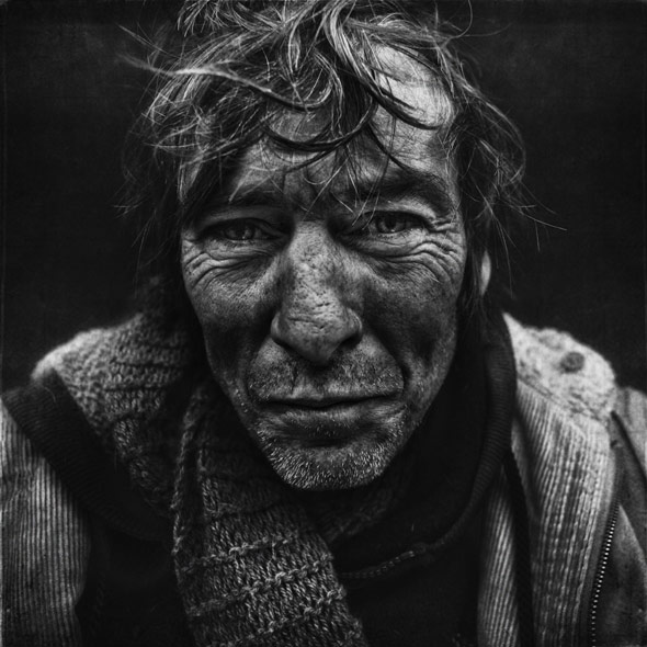 Huanting photos of homeless people.