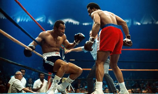 Mar 26th - George Foreman TKOs Ken Norton in 2 for heavyweight boxing title in Caracas, Venezuela.