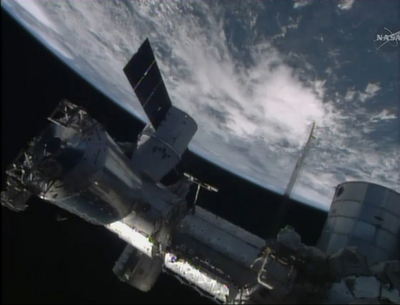 Space x Dragon attached to the ISS.