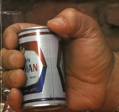 Picture of Andre the Giant holding a 12 ounce can.