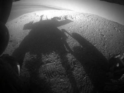 Shadow Portrait of NASA Rover Opportunity on Martian Slope.