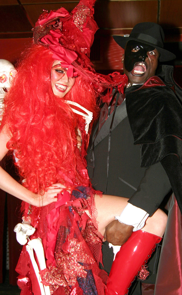Heidi and Seal in 2004, with something red, something dead?