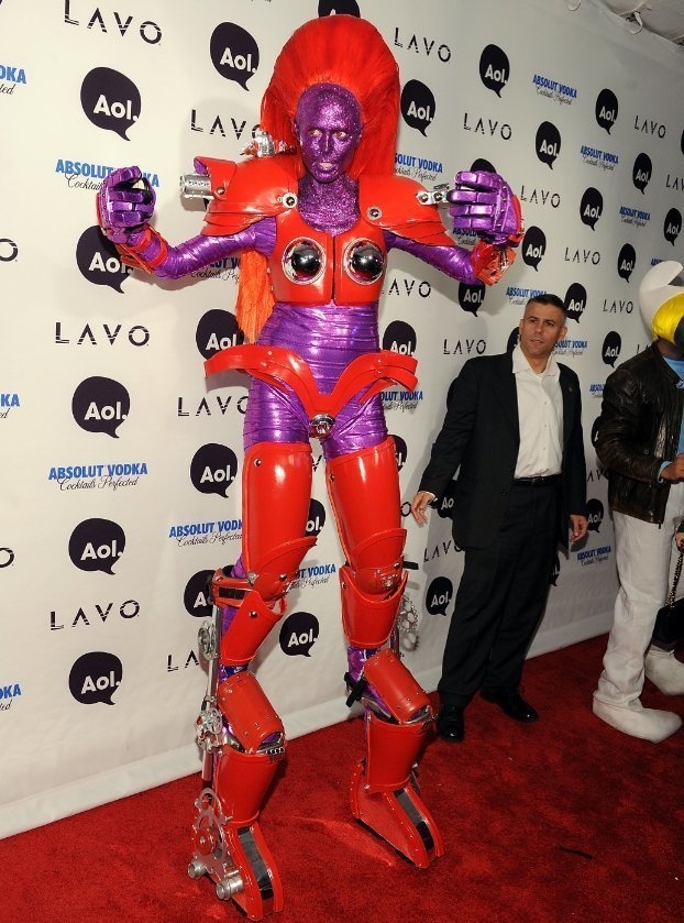In 2010, Ms Klum, in a purple alien costume with leg extensions!