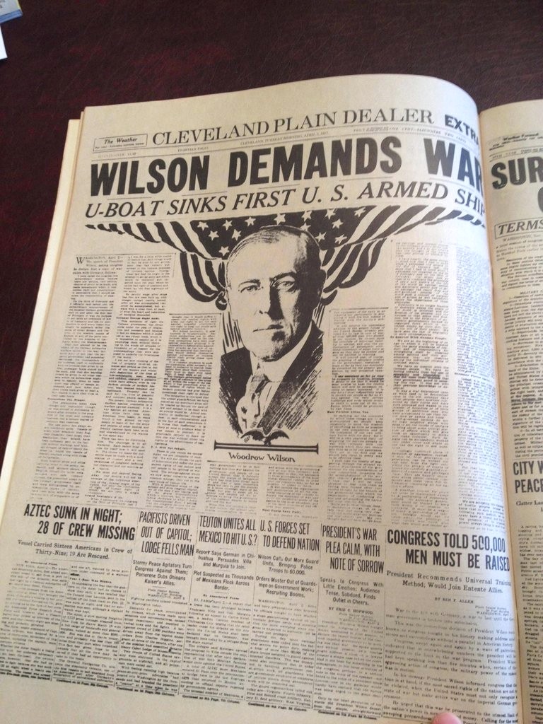 newspaper - The Phantom Cleveland Plain Dealer Wilson Demands Wa UBoat Sinks First U. S. Armed Si Sur Terms Woodrow Wilson City V Peace Center Las Aztec Sunk In Night Pacifists Driven Teuton Unites All U.S. Forces Set President'S War Congress Told 500.000