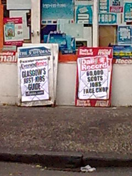 I saw these signs outside my local newsagents :