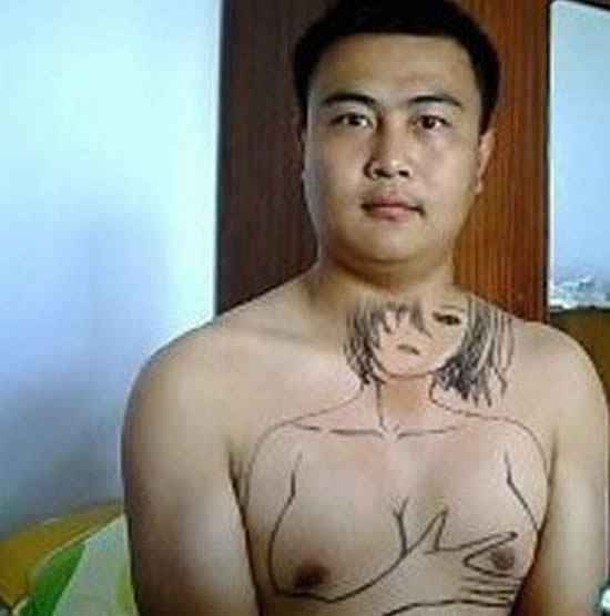 Guy has woman tattooed on his chest