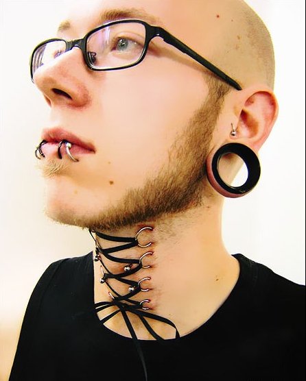 Wild Tattoos, Piercings, and Implants!