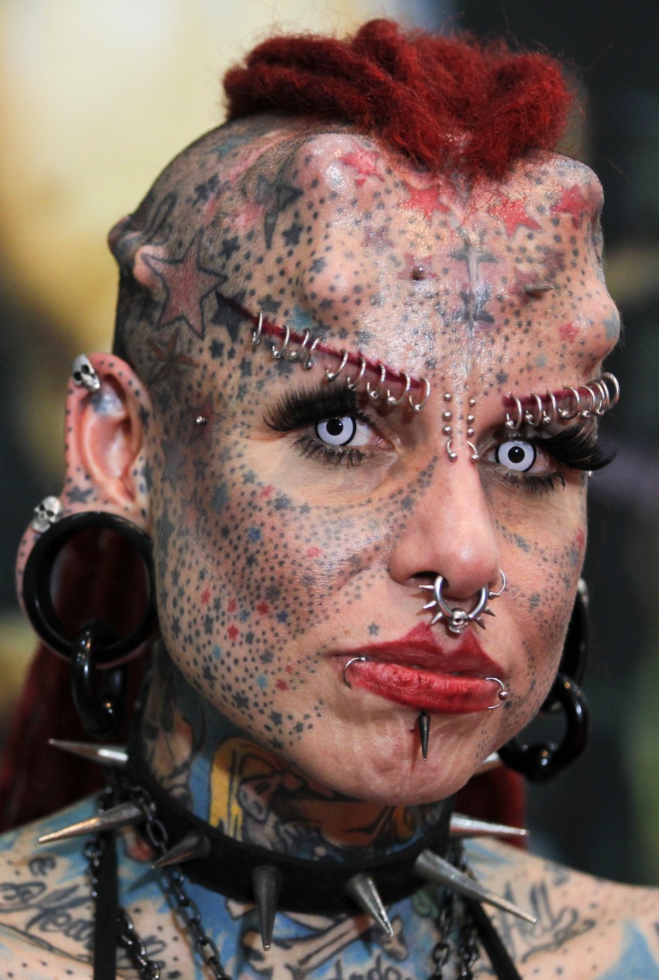 Wild Tattoos, Piercings, and Implants!