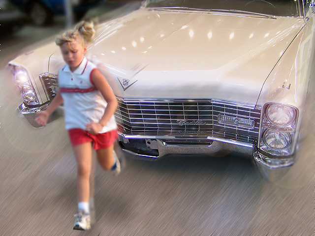 Cadillac photoshopped to look like it s about to run over the neighbor kid
