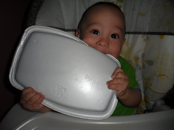 Baby Milk - A drug that causes strong hallucinations. In this case he thinks that is a pancake. But boy he is way off.  D