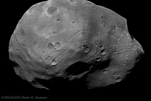 Phobos, mars' closest moon. We better not settle down on that red planet because that moons gonna crash into it in 100 million years or so.