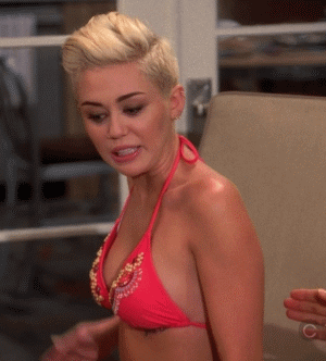 Miley Cyrus on 2 and a Half Men checks her boobs