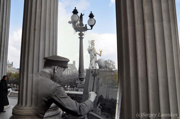 Vienna 1945. Senior Lieutenant Vladimir making a sketch of the fountain with a statue of Athena in front of the Parliament Building.