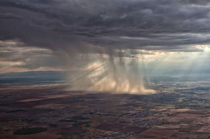 Airplane View Of A Distant Storm
