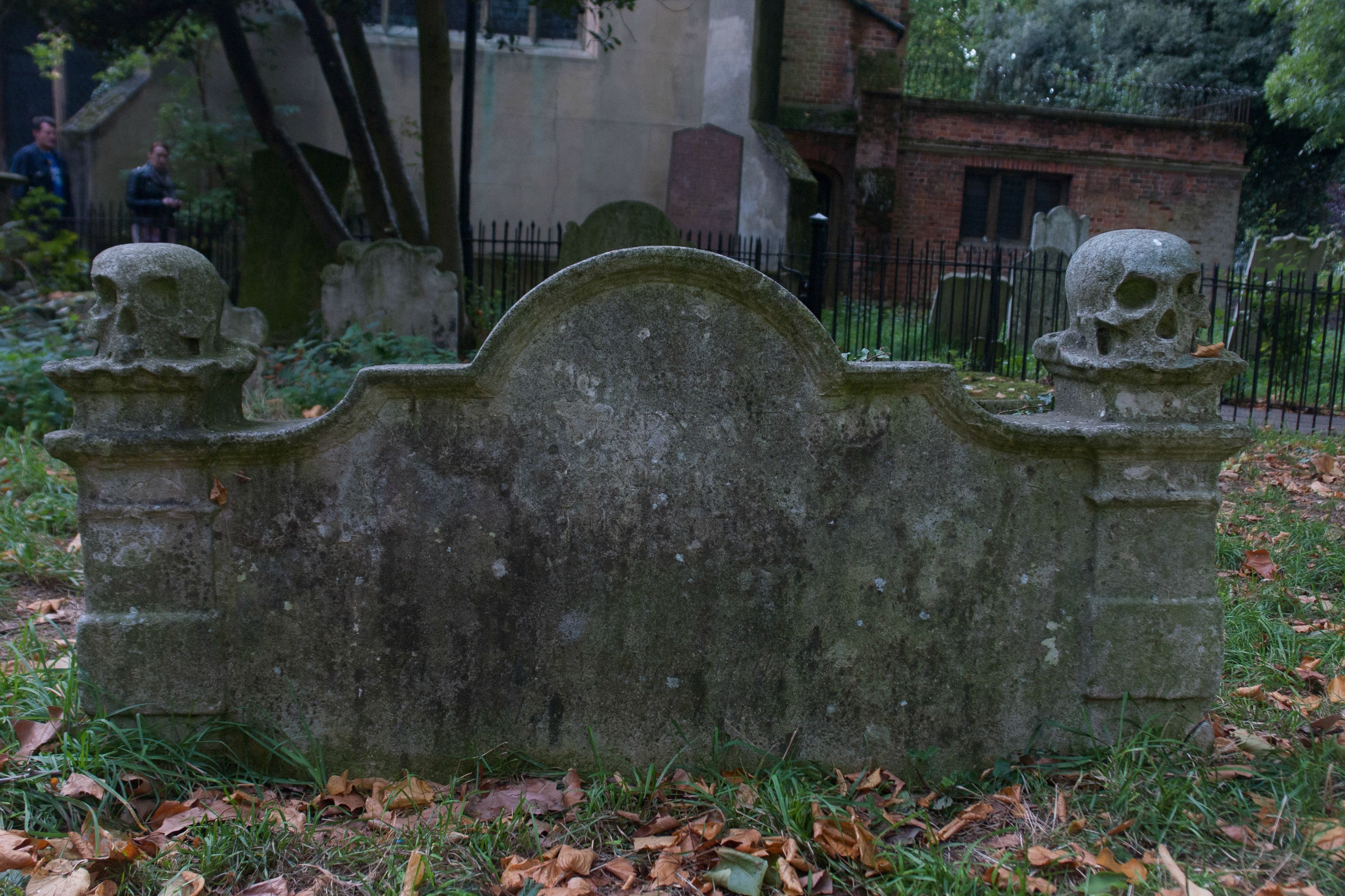 Headstone with two carved skulls, Stoke Newington cemetery, London