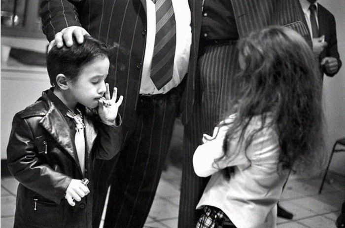 Five-year-old gypsy boy on New Years Eve 2006 in the gypsy community of St. Jacques, Perpignan, Southern France. It is quite common in St. Jacques for little boys to smoke