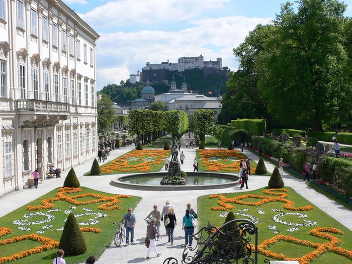 Zwerglgarten Dwarf Garden of the Mirabell Palace, Salzburg, Austria, with dozens of creepy dwarf statues. The palace and the garden were built by Prince Archbishop Wolf Dietrich in 1606.
