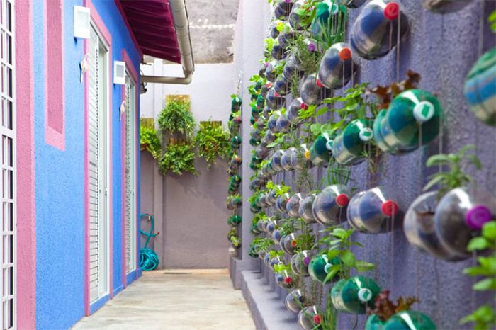 A Plastic Bottle Vertical Garden by the Lar Doce Rar means Home Sweet Home project Rosenbaum Design and Luciano Huck, Brazil