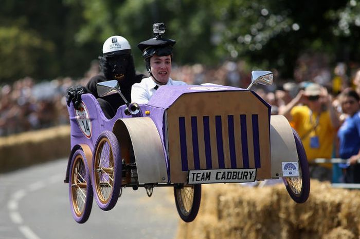 A team go over a jump during the Red Bull Soapbox Race at Alexandra Palace in London, England. The Red Bull Soapbox Race returned to London after nine years and encourages competitors to build and race their own homemade soapboxes down a hill.