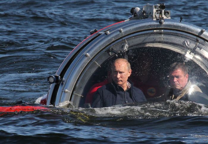 Russian President Vladimir Putin rides in a submersible in the Baltic Sea near Gotland Island, Russia. The vessel dove to the sea floor to explore a sunken