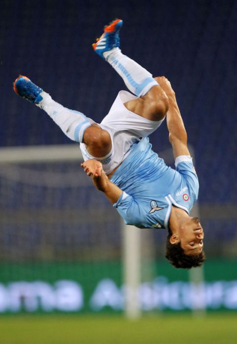 Honorato Hernanes of SS Lazio celebrates after scoring the team's third goal during the Serie A match between Calcio Catania and SS Lazio at Stadio Olimpico.