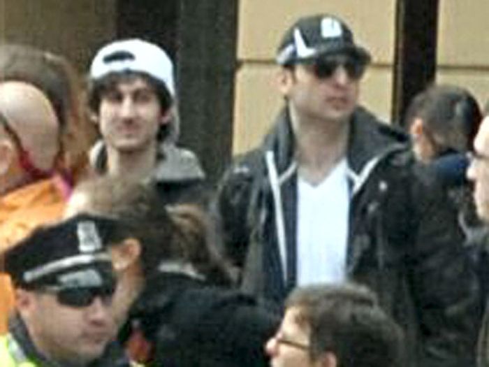 In this image released by the Federal Bureau of Investigation, two suspects in the Boston Marathon bombing walk near the marathon finish line in Boston, Massachusetts. The twin bombings at the 116-year-old Boston race resulted in the deaths of three people with more than 170 others injured.