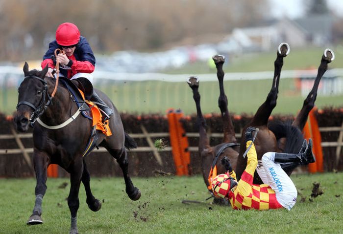 Ifandbutwhynot ridden by Timmy Murphy falls during the QTS Scottish Champion Hurdle Race, at Ayr racecourse in Ayr, Scotland.