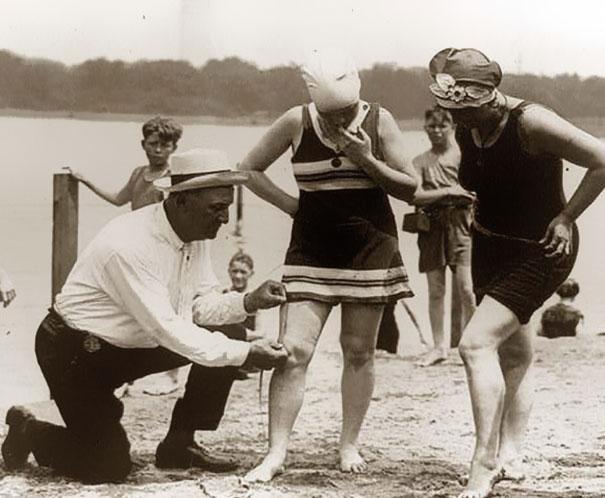 Measuring bathing suits  if they were too short, women would be fined, 19208242s