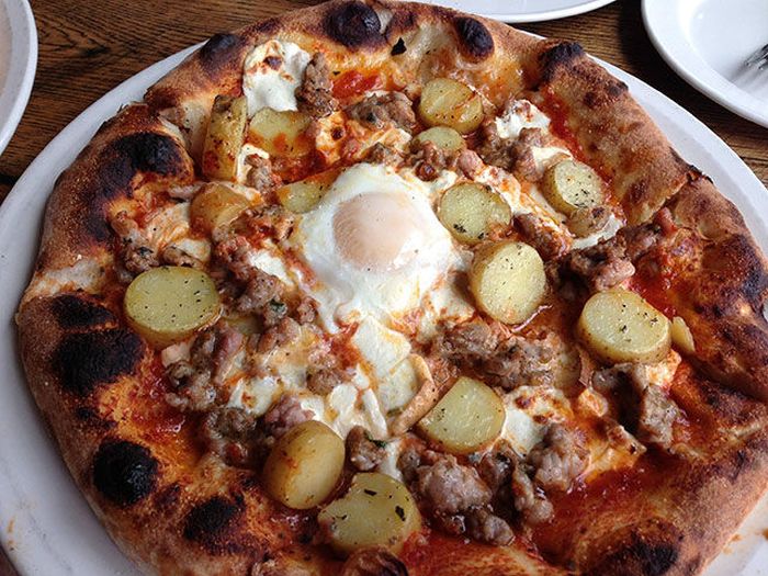 pizza with egg in middle