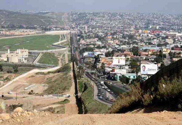 The US-Mexico BorderTo the right lies Tijuana, Baja California and on the left is San Diego, California. The building in the foreground on the San Diego side is a sewage treatment plant built to clean the Tijuana River