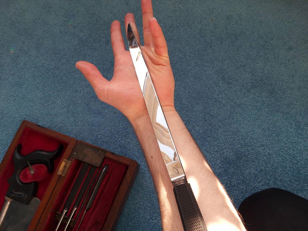 Largest of the knives is the length from my elbow to fingertip.