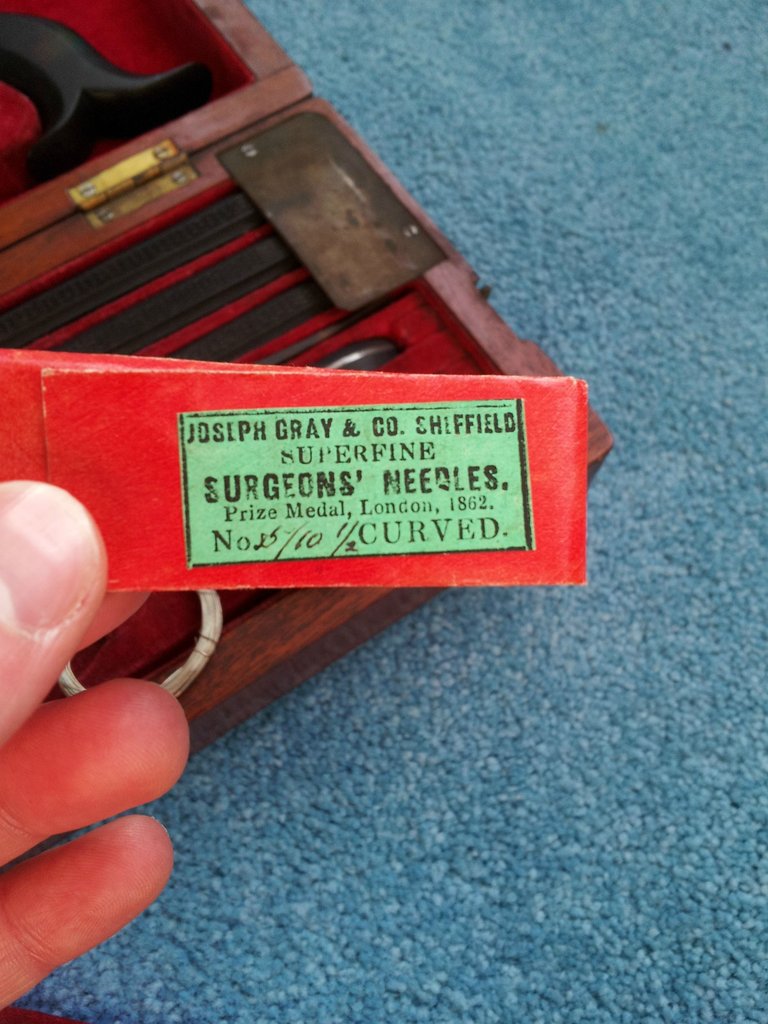 The label on the pack of needles.