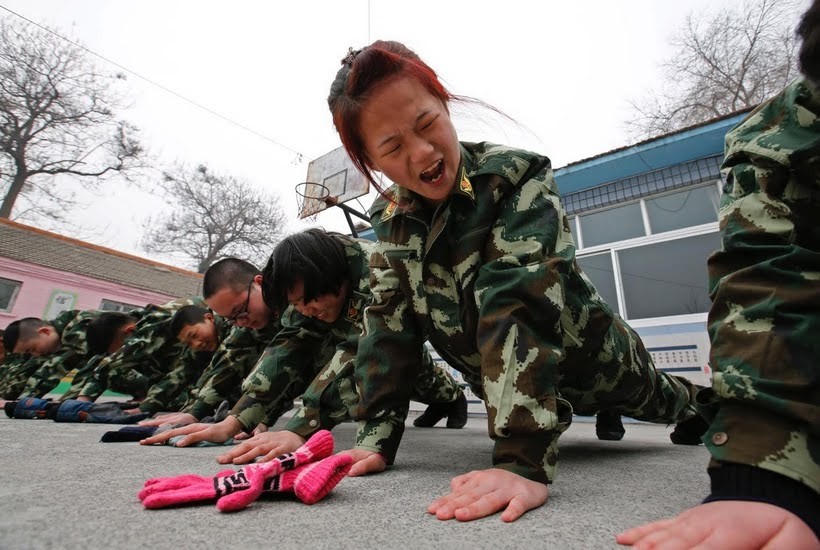 Students are given military-style punishments at the Internet-free boot camps.
