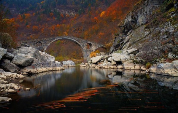 Dyavolski Most, in Ardino, Bulgaria, is a remote, stone foot bridge tucked way in the wild surroundings