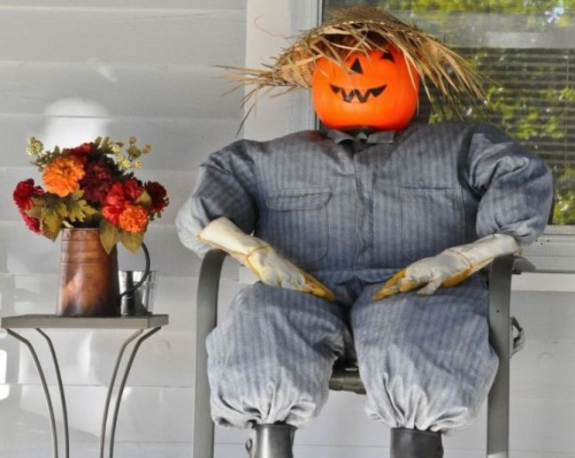 Yard leaves stuffed into old clothes makes a great scarecrow and your lawn will look better!.