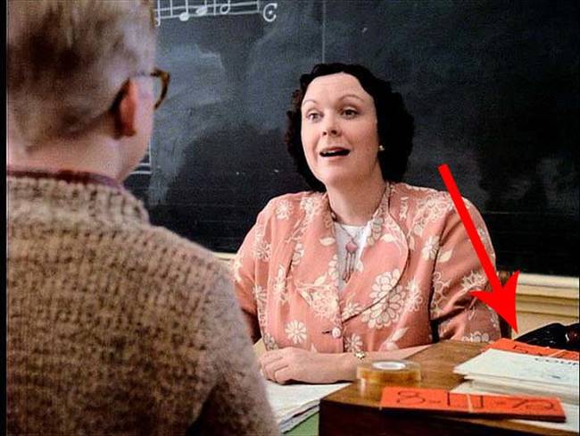 There is a 1980s math book on Miss Shield's desk.
