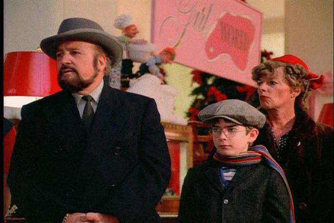 Jean Shepherd, the film's screenwriter and narrator, appears in the scene at the mall informing Ralphie and Randy that the end of the line to meet Santa is much farther down the aisle.