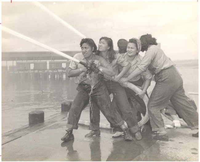 Volunteers learn how to fight fires at Pearl Harbor c. 1941 - 1945