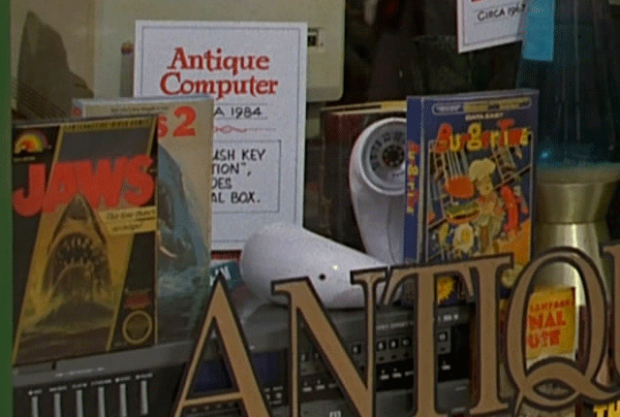 In the window of the cafe, 80s Marty sees several Nintendo games.