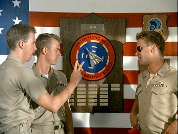 There is no Top Gun Trophy in real life. You either pass the course or you dont.
