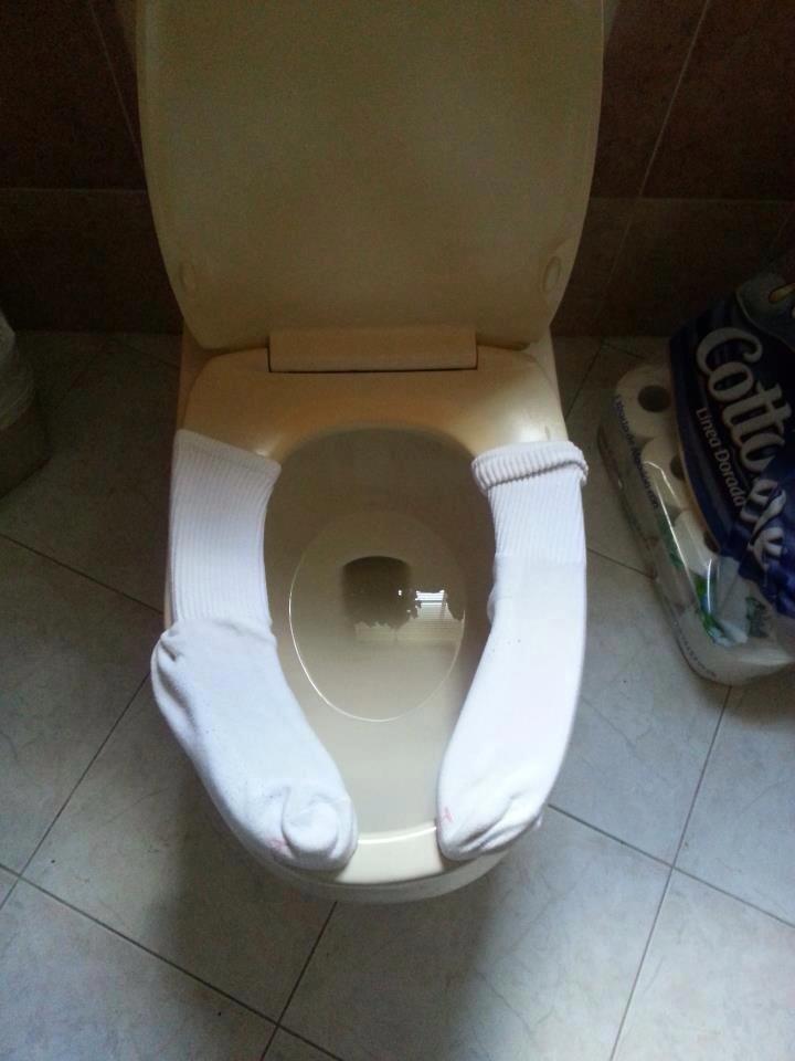 Warm up your toilet seat with socks.