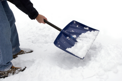 Spray your shovel with non-stick cooking oil before shoveling