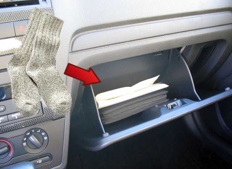 Keep a spare pair of socks in your car's glove compartment.You never know when you might step in a slush puddle, or if you need to slip socks over your windshield wipers to protect them from the snow or frost.