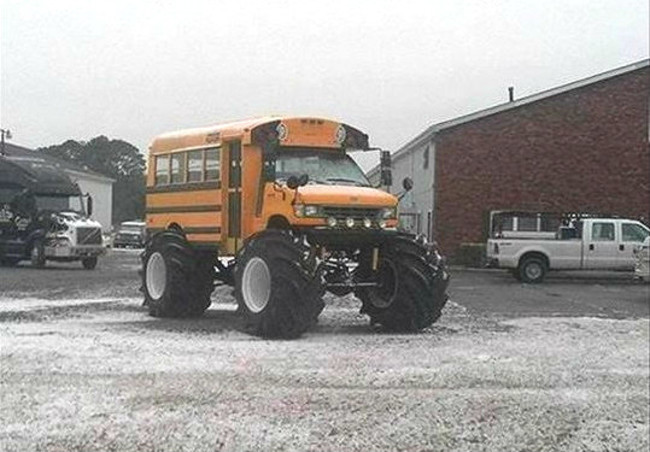 The driver and passengers of this school bus