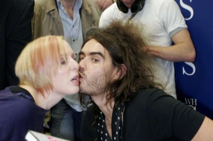This is possibly the most awkward kiss that a camera has had the misfortune to capture. But Russell Brand would have it no other way.