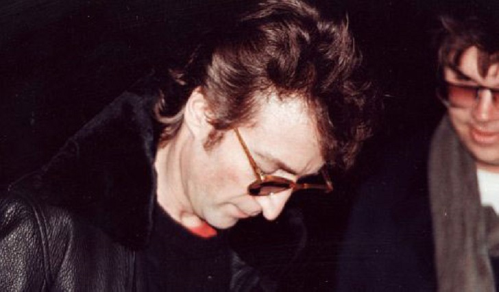 John Lennon (October 9, 1940 – December 8, 1980) – In this picture, John Lennon is signing an autograph for Mark David Chapman. This is the same person that would murder him just 6 hours after this picture was taken.