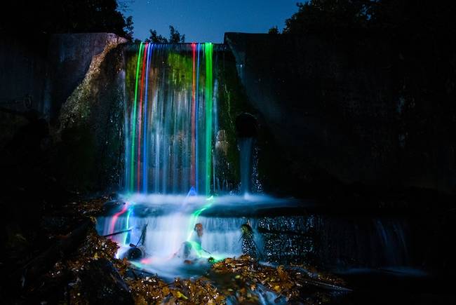 Glowsticks over a waterfall