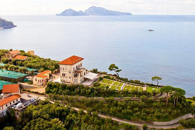 ITALY: Situated on over 25 acres of olive groves, vineyards, and citrus groves, this home overlooks the Gulf of Naples. The estate includes several buildings, and the main house has four levels and two elevators. The entire property is selling for $61 million.