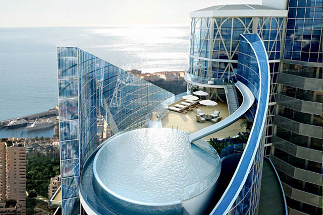 MONACO: One of the most expensive luxury homes in the world, the Sky Penthouse in the Tour Odeon Tower, is a five-story story complex that has a rooftop pool overlooking the Mediterranean sea. It costs an estimated $400 million — but imagine how fun that slide would be.
